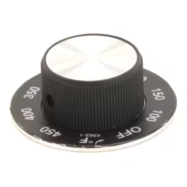 A round black and silver temperature control dial with degree markings, typically used for ovens or stoves.
