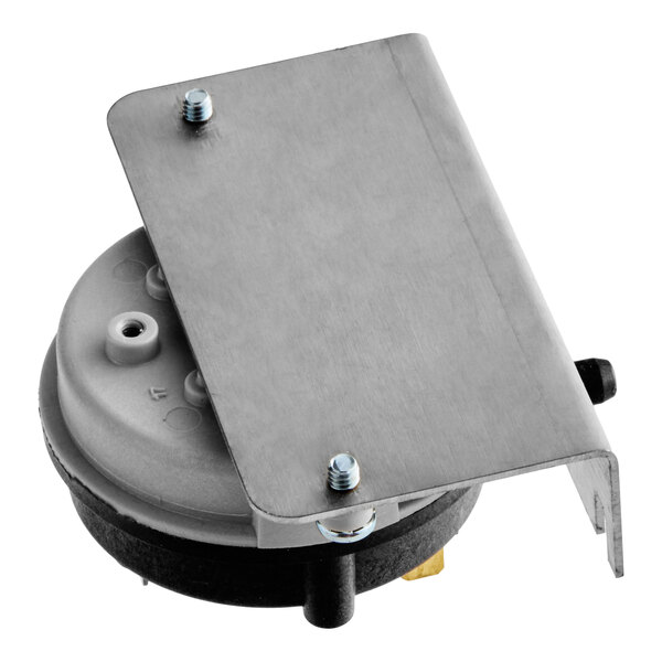 An air pressure switch assembly with a metal mounting bracket.
