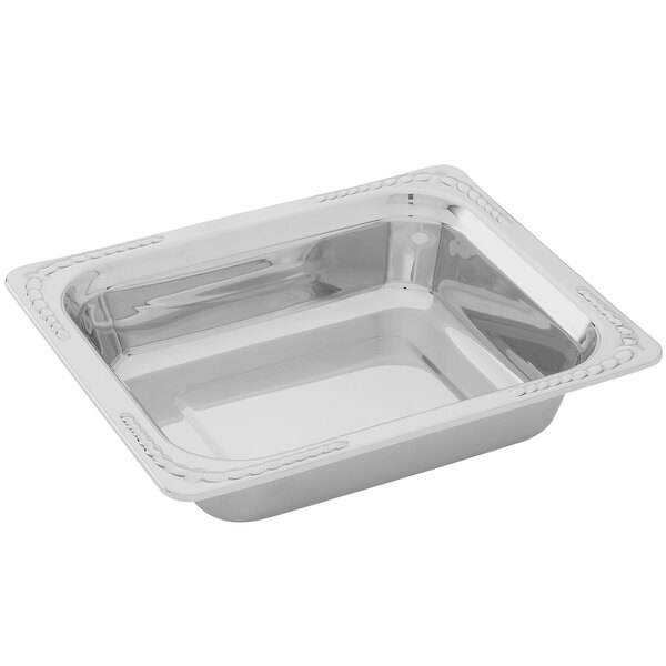 A silver square dish with a white border.