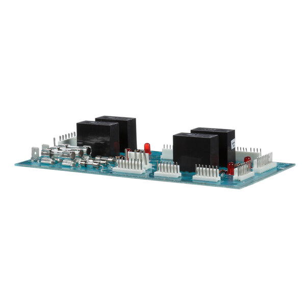 A Groen Z098664 control circuit board with two electronic components and a white label.