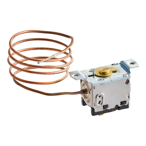 A metal thermostat component with a coiled copper tube attached.