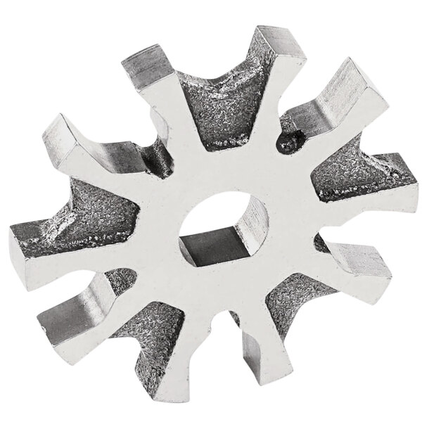 A silver metal gear with holes in it.