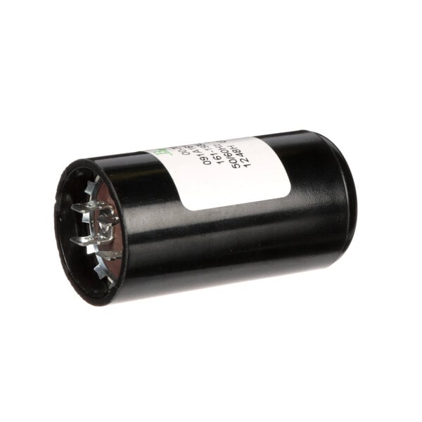 A close-up of a black Hobart capacitor with a white label.