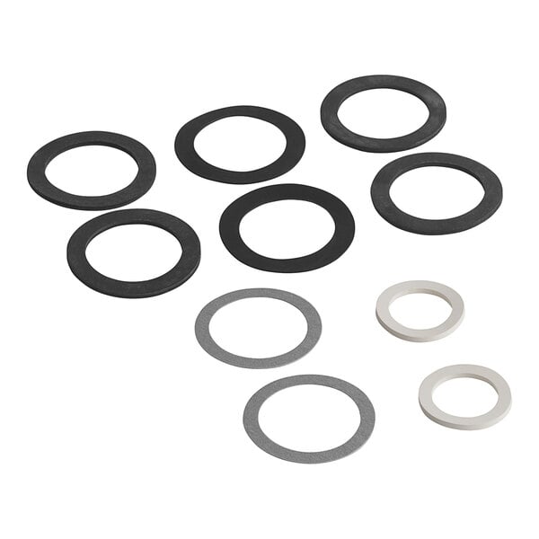 A group of black and white gaskets and rubber washers in a package for a Hatco Sanitizing Sink Heater.