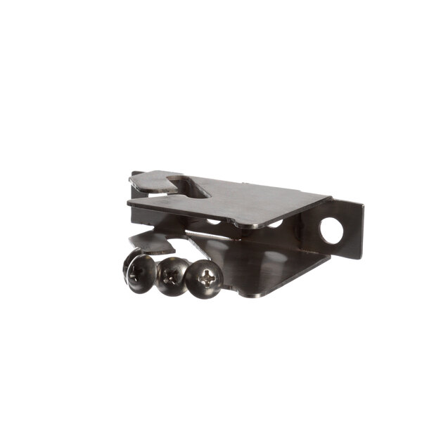 A Randell hinge center with two screws and a screwdriver on a table.