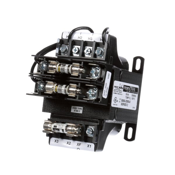 A close-up of a Salvajor transformer assembly with a fuse.