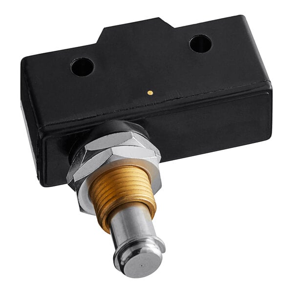 An American Range oven door switch with black and gold metal pieces and a yellow button.