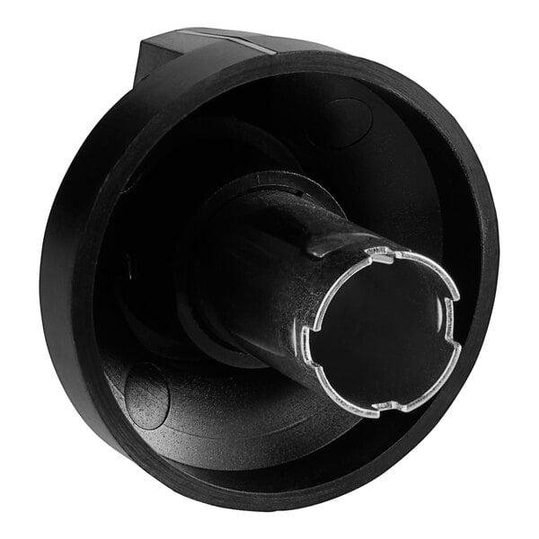 A black and white American Range knob with a metal insert.