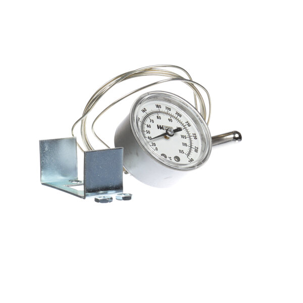 A close-up of a white Wilder thermometer with a metal bracket.