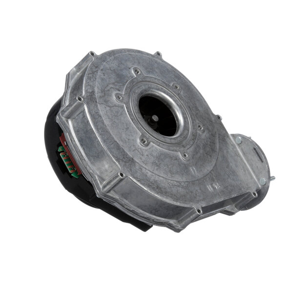 A metal circular object with a metal fan inside and a black plastic cover.
