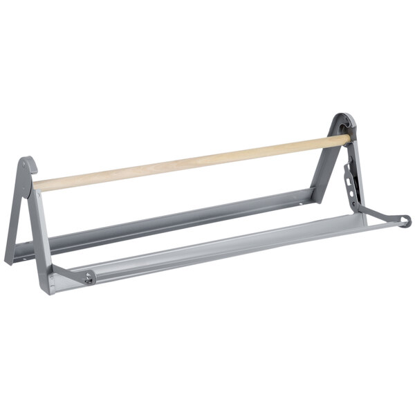 A Bulman paper cutter with a wooden handle and metal rack.