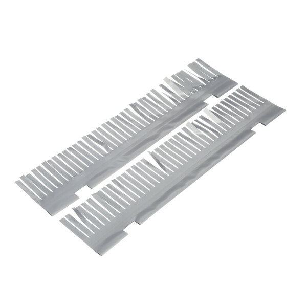 A pair of silver plastic comb strips with white tape on the ends.