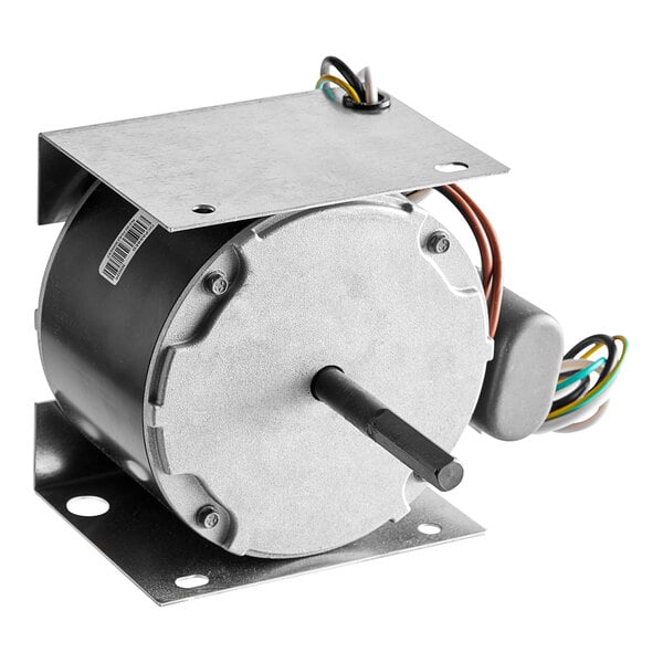 A Manitowoc Ice fan motor with wires on top.