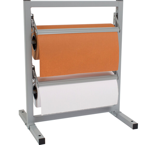 A Bulman paper rack with orange paper rolls on metal stands.