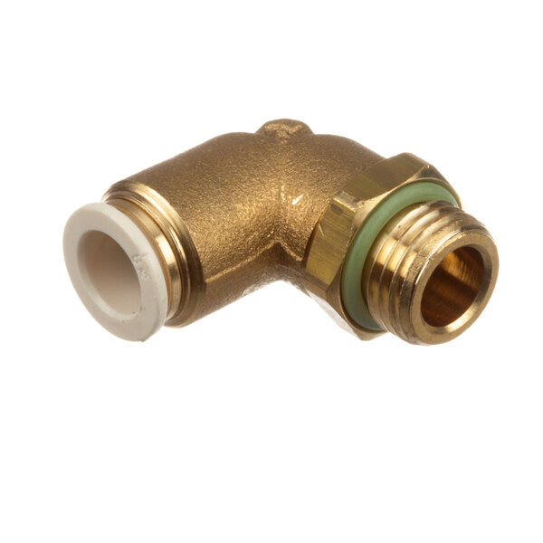 A close-up of a brass Franke Fast Coupling with a white pipe fitting.