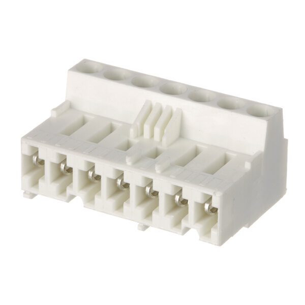 A close-up of a white Rational connector with four electrical holes.
