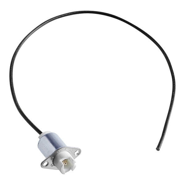 A black and white cable with a small connector attached to a Vulcan socket.