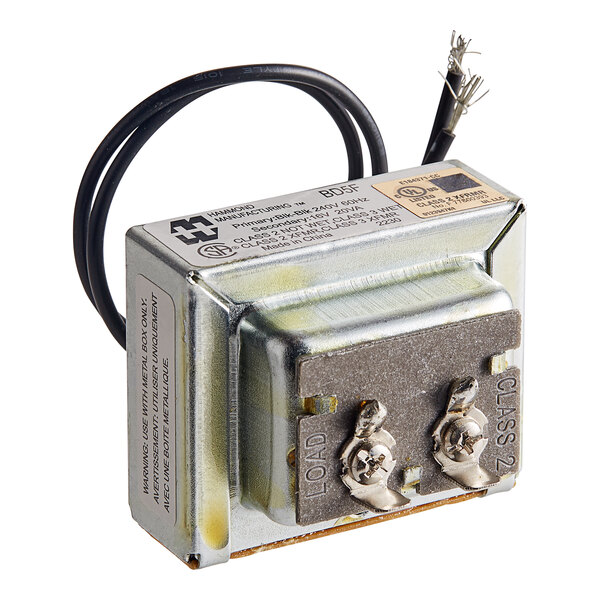 A close-up of a Cleveland Trans 240/16/60 transformer with wires and a metal cover.