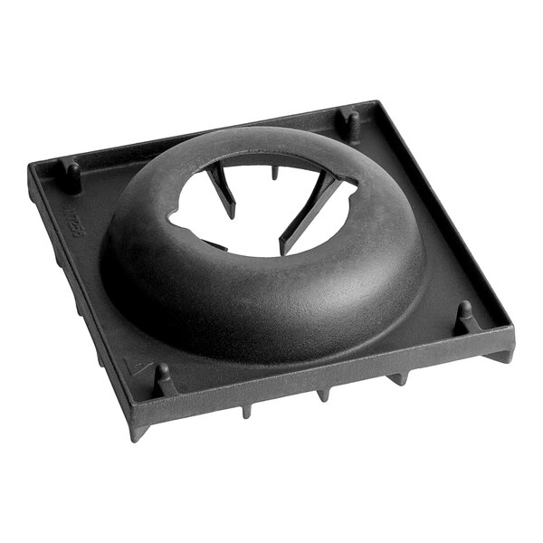 A black plastic square Vulcan grate with a hole in it.