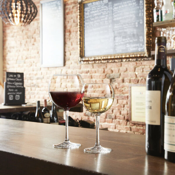 Two Chef & Sommelier Cabernet wine glasses on a table.