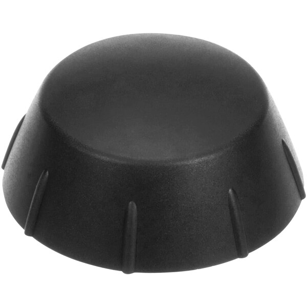 A blue plastic cap with a black dial.
