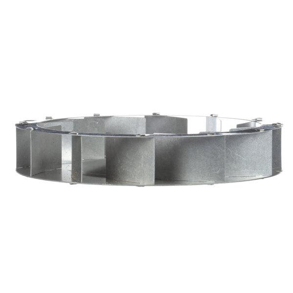 A close-up of a Moffat fan blade, a circular metal object with holes.