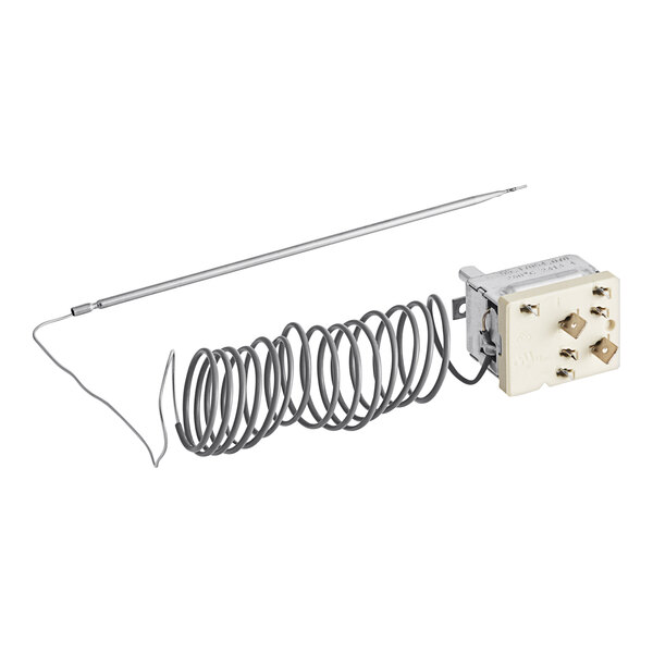 A Moffat thermostat with a white wire and a metal spring attached.