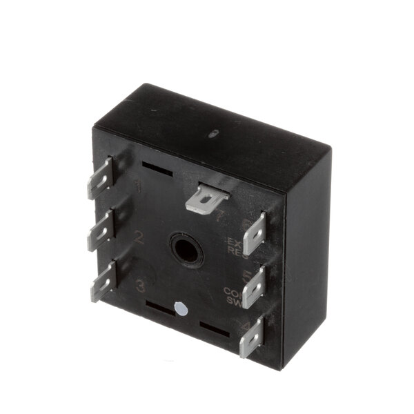 A black square Groen NT1613 timer with metal buttons and two wires.