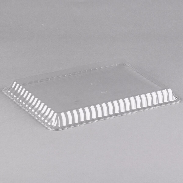 A clear plastic Fineline rectangular tray.