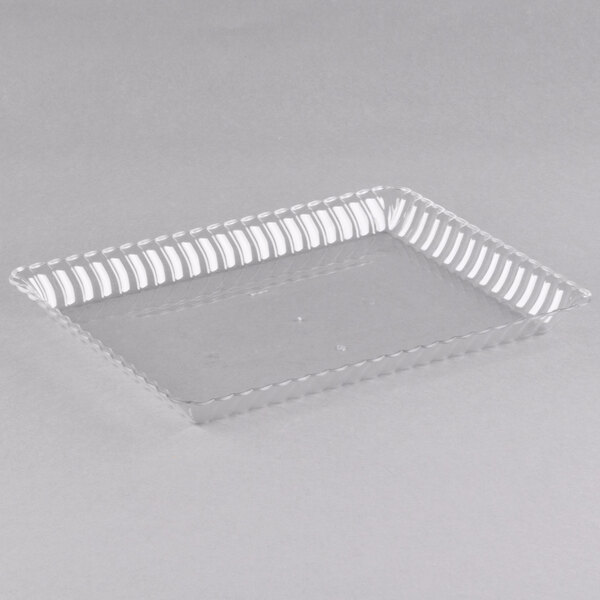 A clear plastic rectangular tray with a curved edge.