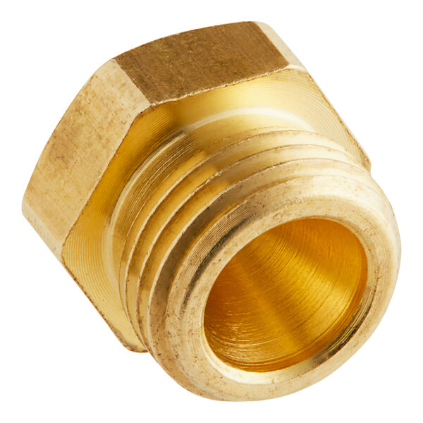 A brass threaded male connector with a gold nut with a thread.
