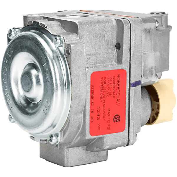 A silver Bakers Pride gas valve with a red label on it.