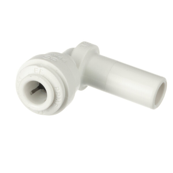 A white plastic pipe with nozzle.