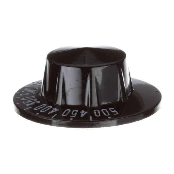 A black plastic Vulcan thermostat knob with white text reading 100.