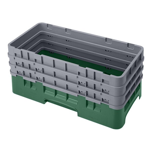 A green and gray plastic half-size open base rack with three extenders.