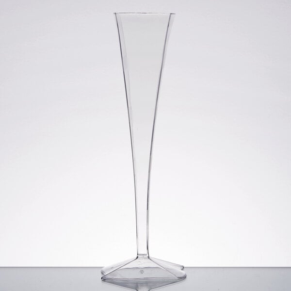 A Fineline clear plastic champagne flute with a thin stem.