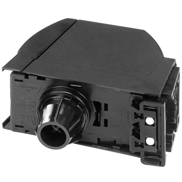 A black plastic Cornelius UFB valve connector with a black plastic cover.