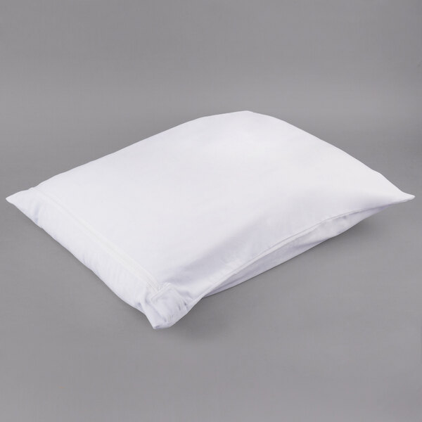 A white JT Eaton bed bug proof pillow protector on a gray surface.
