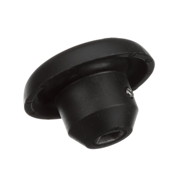 A black plastic round drive socket with a hole.
