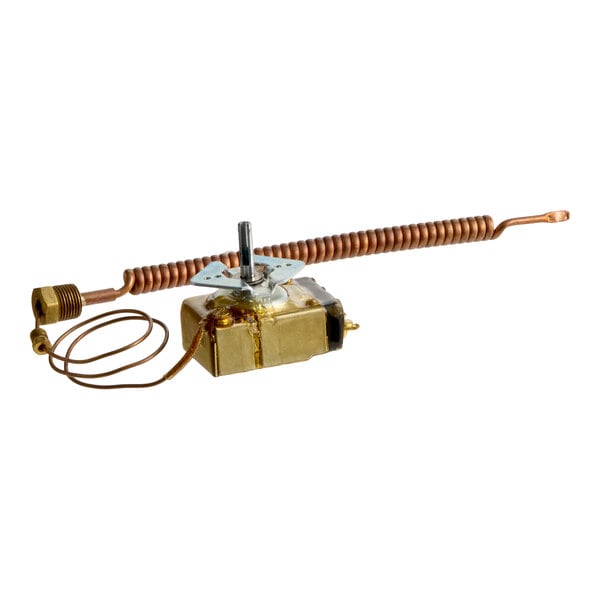 A metallic device with a coiled copper tube, a brass-colored box, and a protruding shaft, likely a thermostat component.