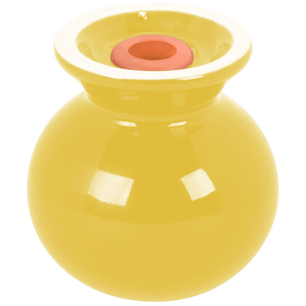 A yellow Fiesta salt and pepper shaker with a red top.