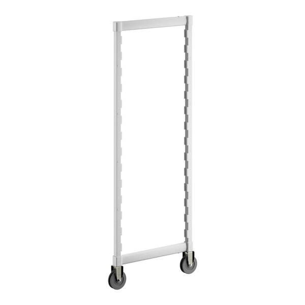 A white rectangular object with black wheels and a black handle.