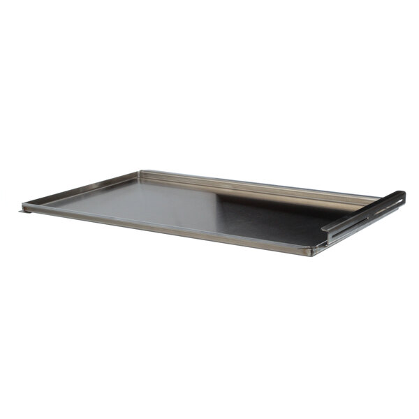 A metal tray with a handle on it.