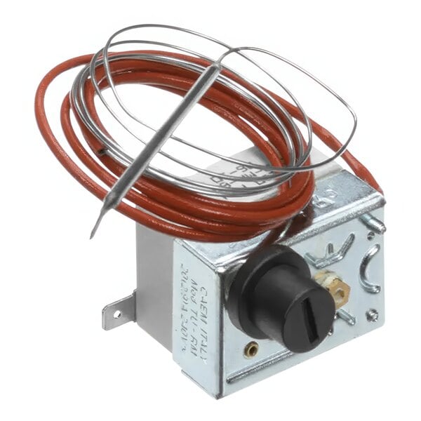 A close-up of a Cadco TR253 safety thermostat with a red wire.