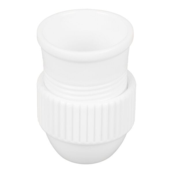 A white, cylindrical plastic object with a ribbed middle section and smooth top and bottom edges.