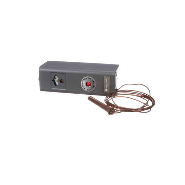 A grey Marshall Air hi temp limit switch with a red button and brown wire.