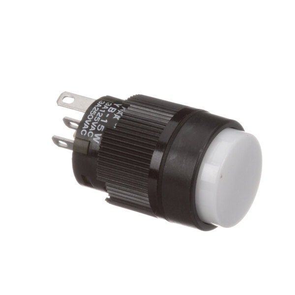 A close-up of a black Blodgett round push button switch with white plastic.