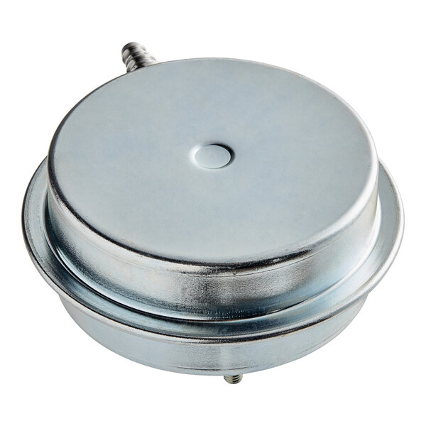 A silver round air flow switch with a white cap.