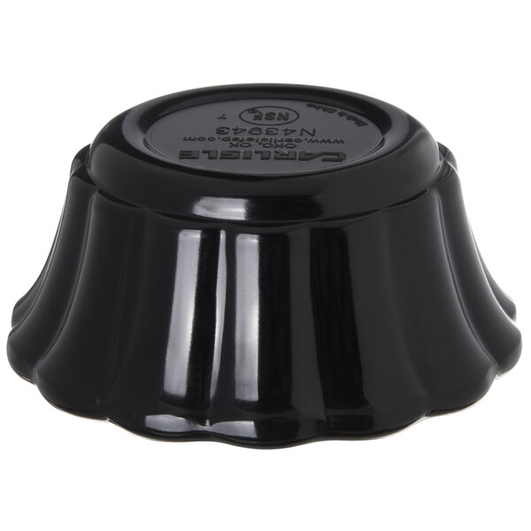 A black Carlisle ramekin with a scalloped design.