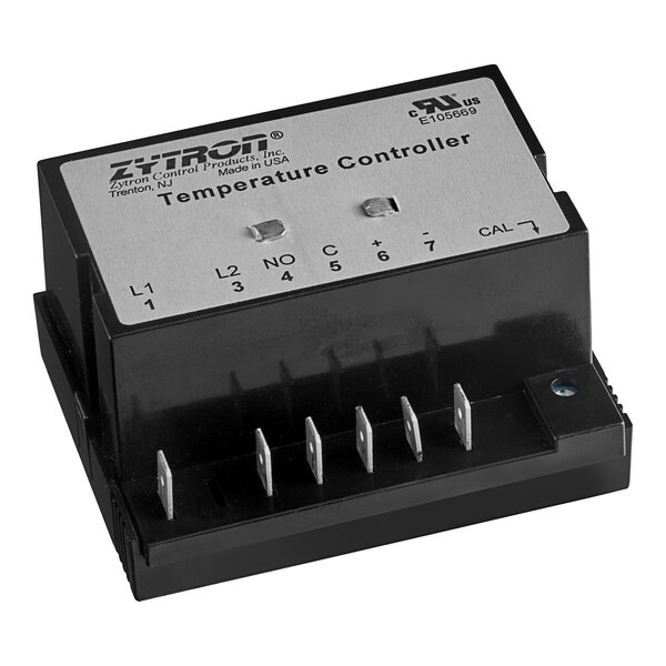 A black and silver US Range thermostat.